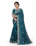 Jwalamukhi Silk Premium Saree in Teal Blue with Gold Zari Border & Floral Design – Elegant Traditional Wear