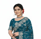 Jwalamukhi Silk Premium Saree in Teal Blue with Gold Zari Border & Floral Design – Elegant Traditional Wear