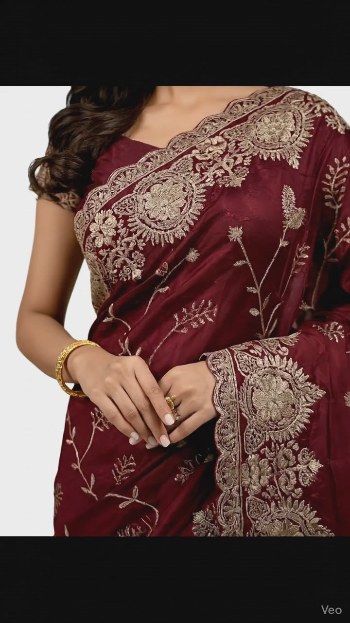 Jwalamukhi Silk Premium Saree in Maroon with Gold Zari Border & Floral Design – Elegant Traditional Wear