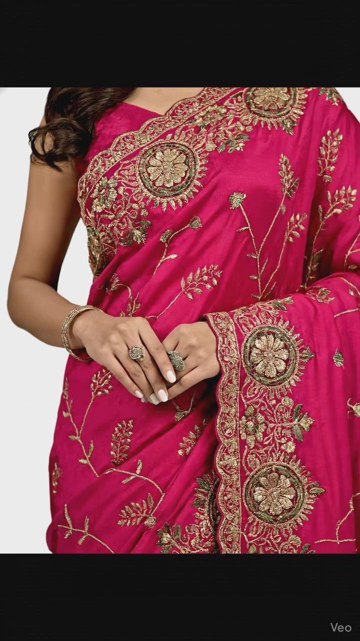 Jwalamukhi Silk Premium Saree in Pink with Gold Zari Border & Floral Design – Elegant Traditional Wear